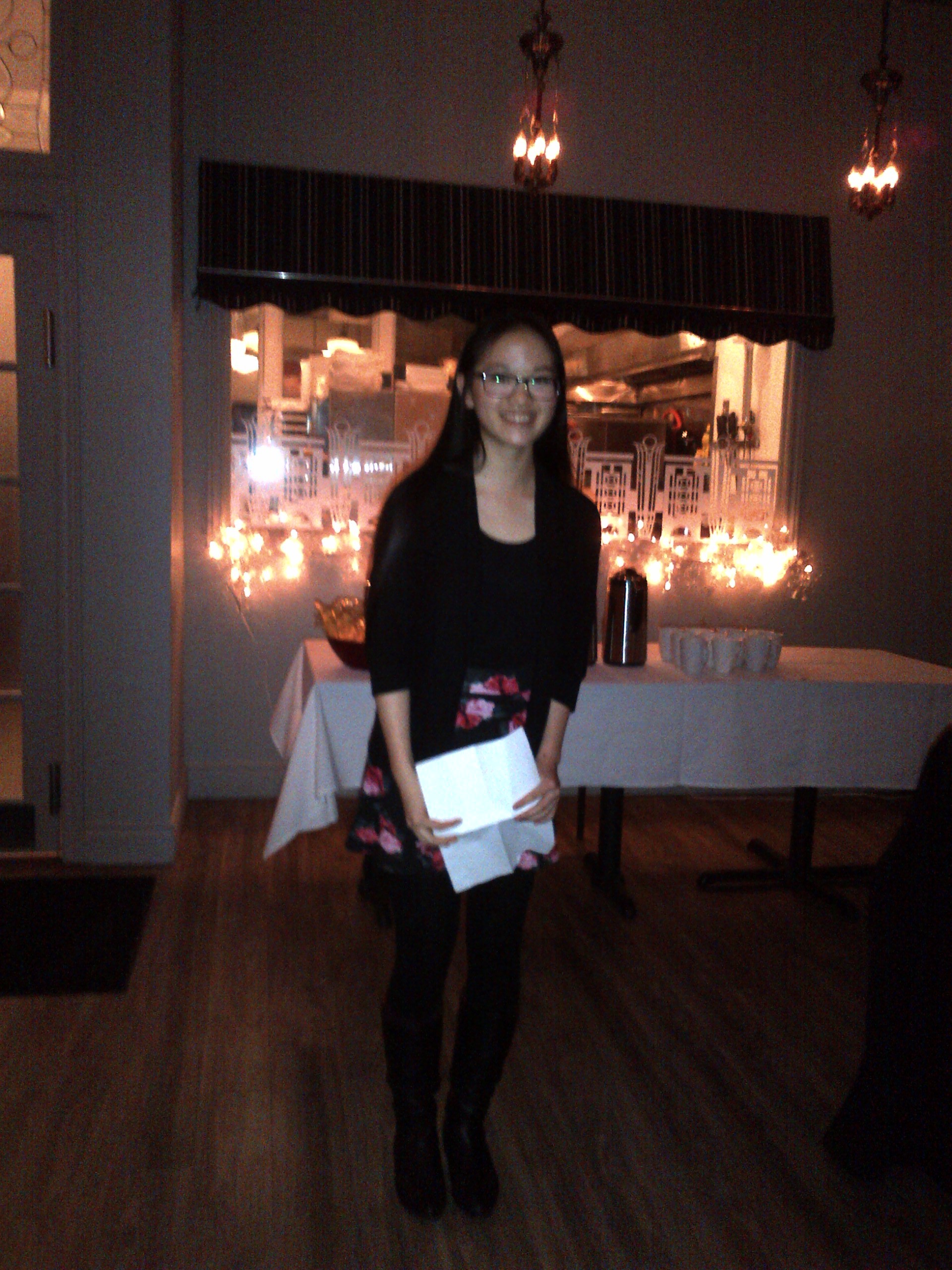 Winner Amy Liu with her prize and certificate